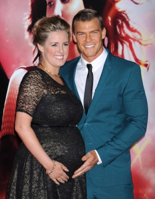 Alan_Ritchson_and_Catherine_Ritchson_attending_the_premiere.jpg